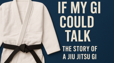 A worn Jiu Jitsu gi hanging in a gym locker room, showing patches, wrinkles, and signs of training and travel.